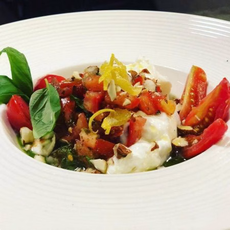 Brurratina e Pomodori conditi al Pesto italienisch Mittagessen Salerno Neuenheim