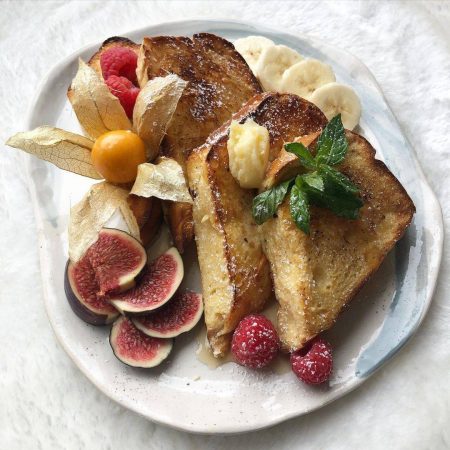 luscious frenchtoast is well soaked for a soft, custardy center, added our homemade maple butter, maple syrup on top